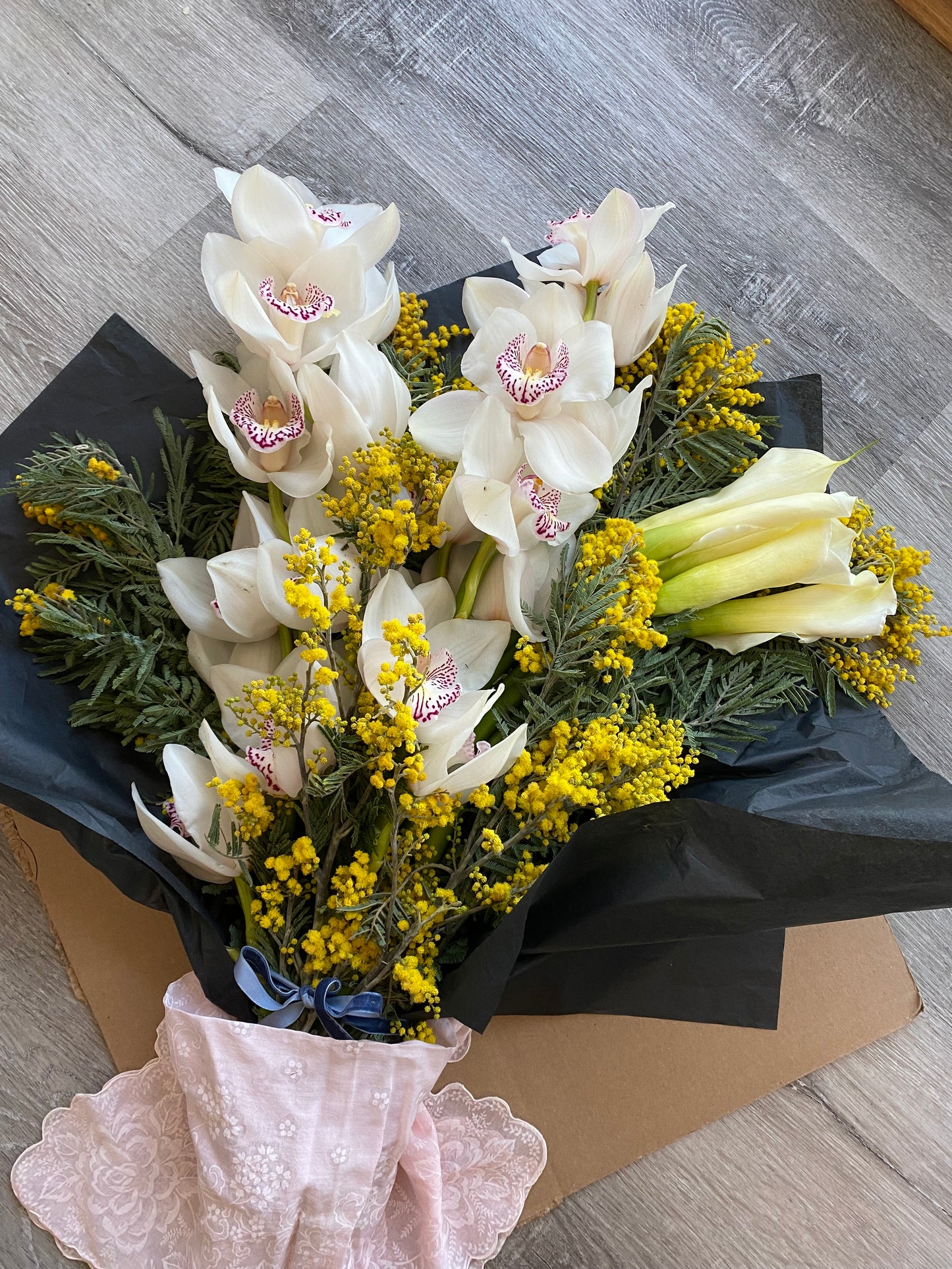 Cymbidiums and callas- fresh cut floral bouquet